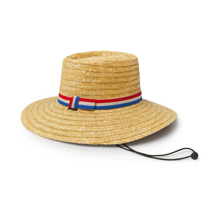 Traditional Chilean straw chupalla hat with red, white, and blue band and chin strap on white background.