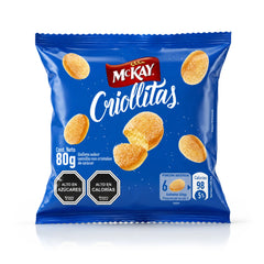 Una bolsa de 80 g de «McKay Criollitas», en la que aparecen unas galletas horneadas de color marrón dorado sobre un fondo azul intenso con el logotipo rojo y blanco de McKay.