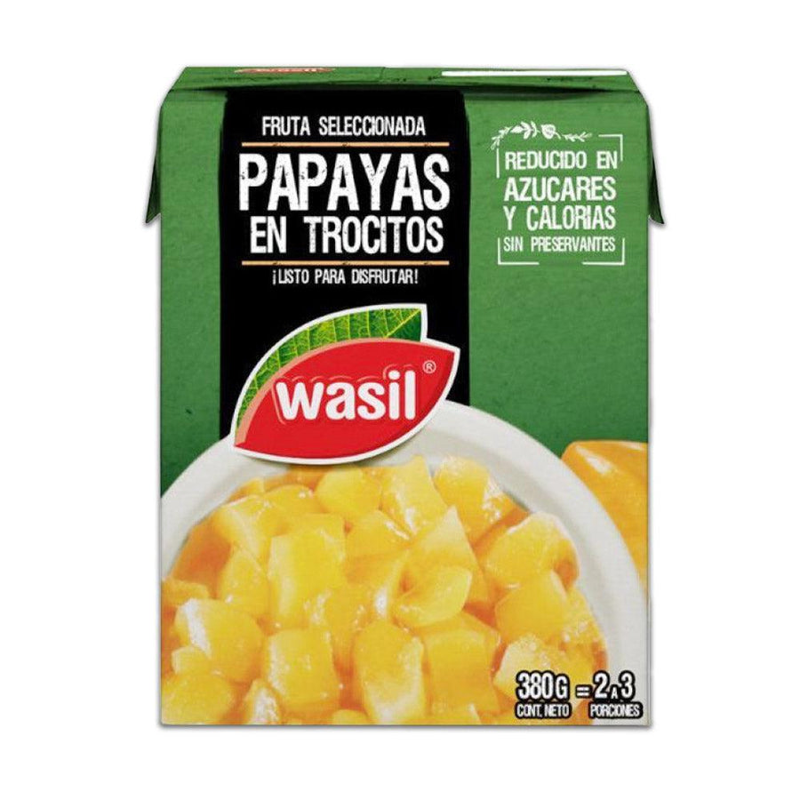 Una caja verde de papayas de Wasil con una foto de trozos de papaya amarilla chilena en la parte delantera.