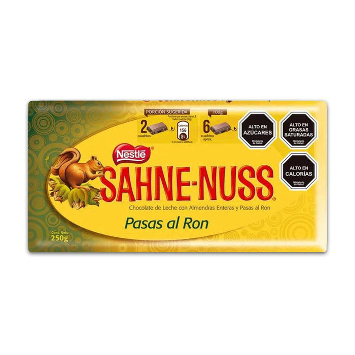 A 250 gram bar of Chocolate Sahne-nuss Pasas al Ron from Chile. Wrapped in yellow and green.