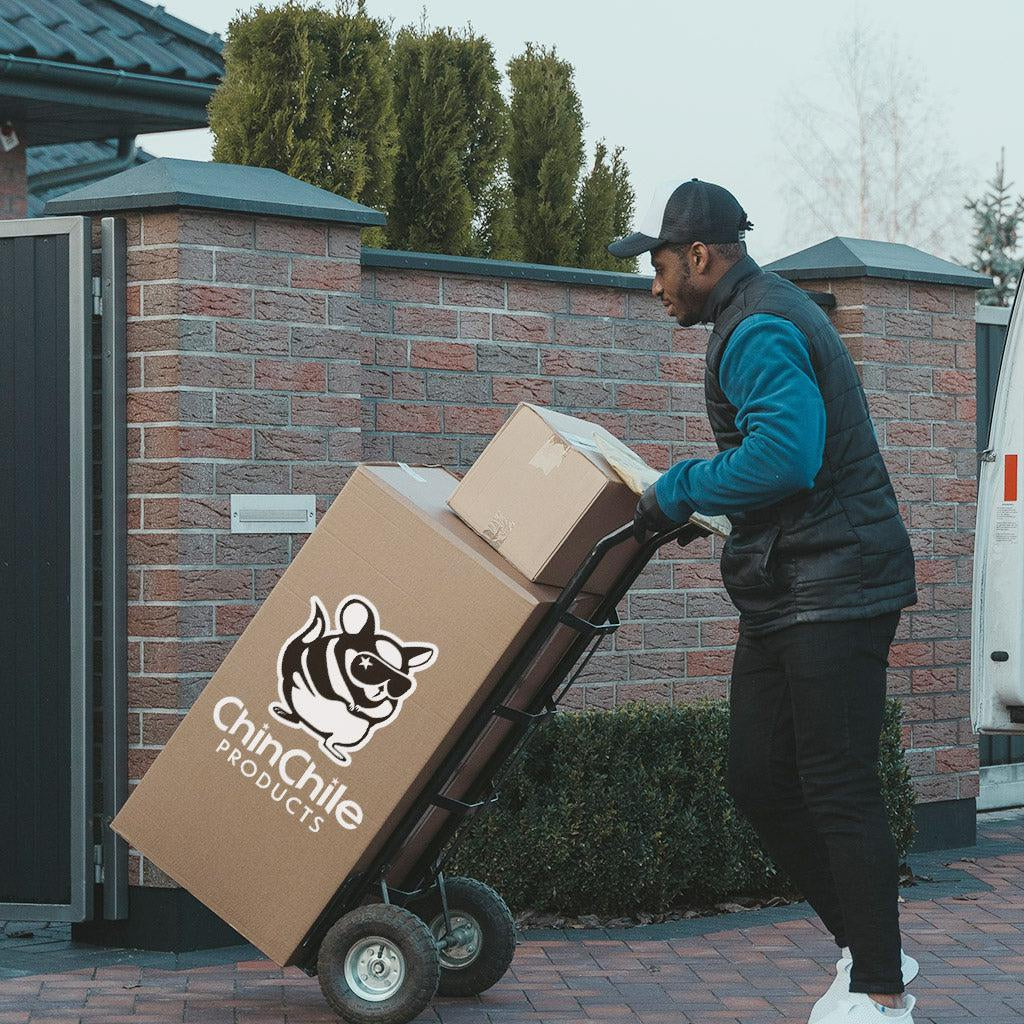 A man moving boxes filled with Chilean products.