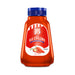 A red bottle with a blue cap of Aji Chileno.