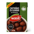 Wasil Castañas en Almíbar – Chilean chestnuts in syrup in green carton packaging on white background.