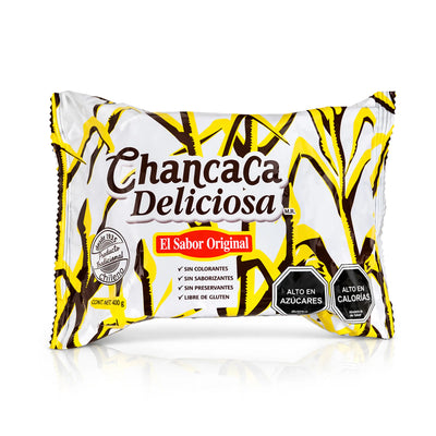 Un paquete de 400 gramos de Chancaca con toques blancos, marrones y amarillos.