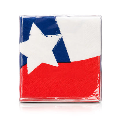 Un paquete de servilletas de papel cuadradas con la bandera chilena estampada, envuelto en plástico transparente sobre un fondo blanco.