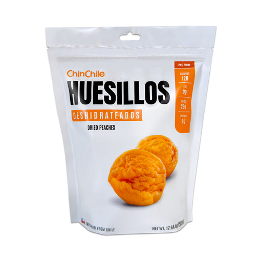 A 500 gram white bag of Huesillos with two bright orange huesillos on the front.