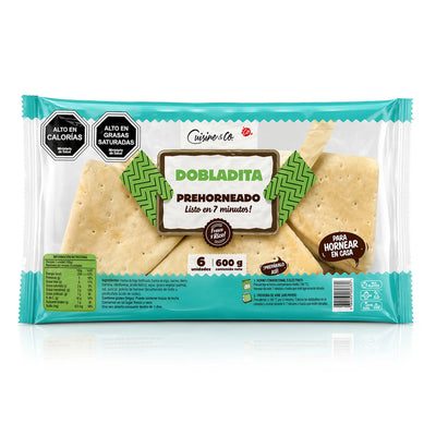 Cuisine & Co. Paquete de pan chileno precocido «Dobladita», 6 unidades (600 g), sobre fondo blanco.