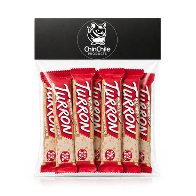 Paquete de barritas de turrón con envoltorios rojos y el logotipo de la marca visible sobre fondo blanco