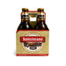 Kunstmann lager beer bottles in a four-pack on a white background