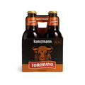 Botellas de cerveza Kunstmann Torobayo en un pack de cuatro sobre fondo blanco