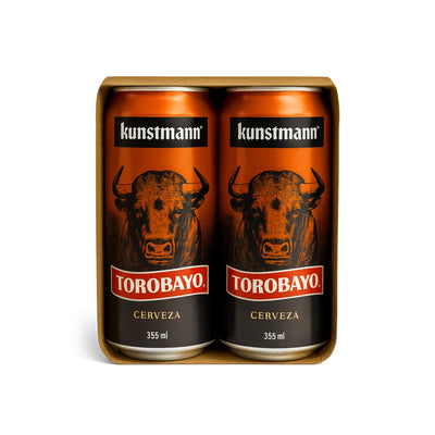 Four cans of Torobayo Cerveza beer in a cardboard holder with 'kunstmann' branding.