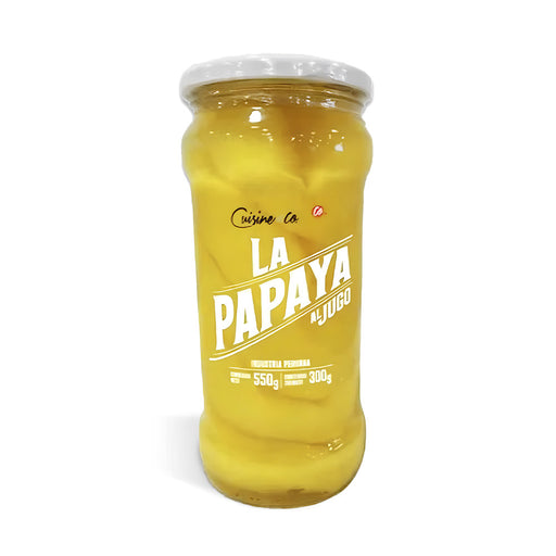 A glass jar of yellow papayas with a white cap.