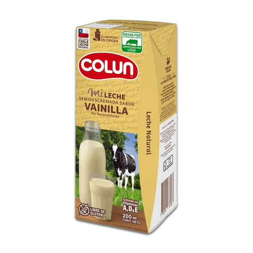 A 200ml cream colored box of Vanilla milk with a picture of a cow and a glass of milk on the front.