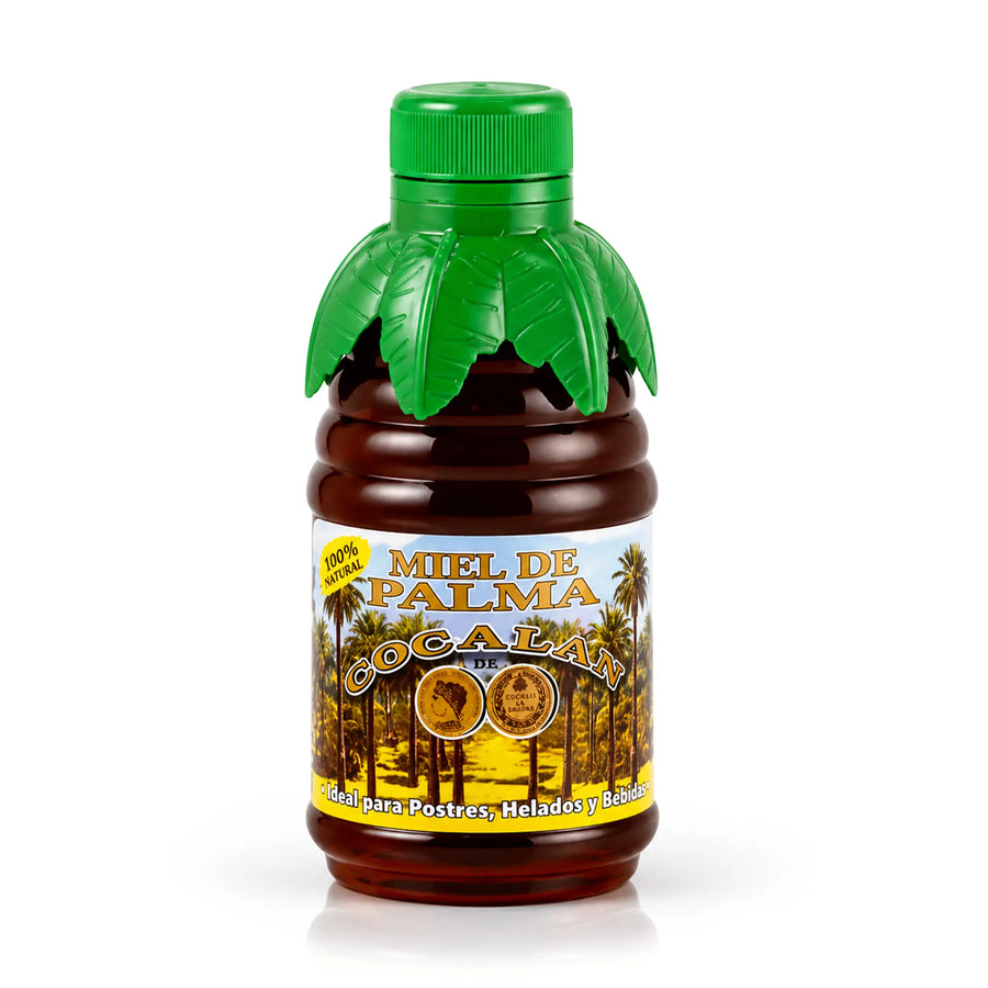 Botella de 330 gramos de miel con tapón superior en forma de hoja verde y etiqueta amarilla con árboles.