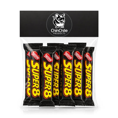 Bolsa de 12 unidades de galletas de chocolate chilenas Super 8 envueltas individualmente en un envase negro con texto amarillo.