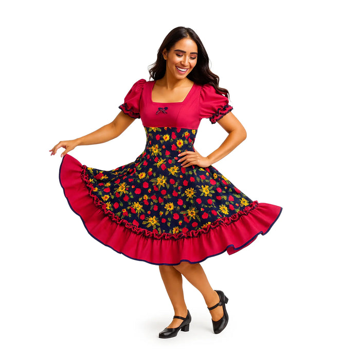 Woman wearing a colorful dress with a floral pattern on a white background