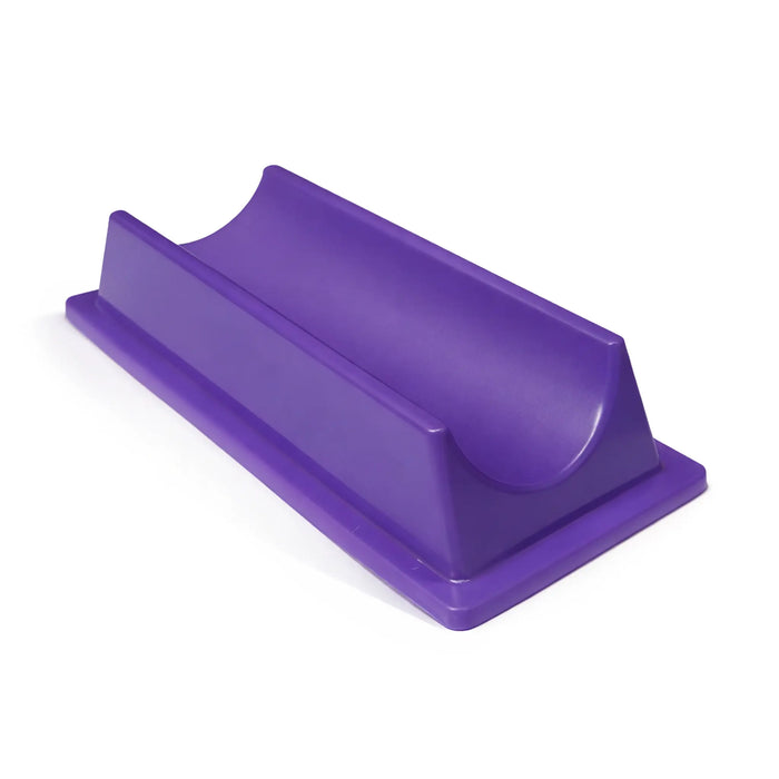 Purple plastic object on a white background