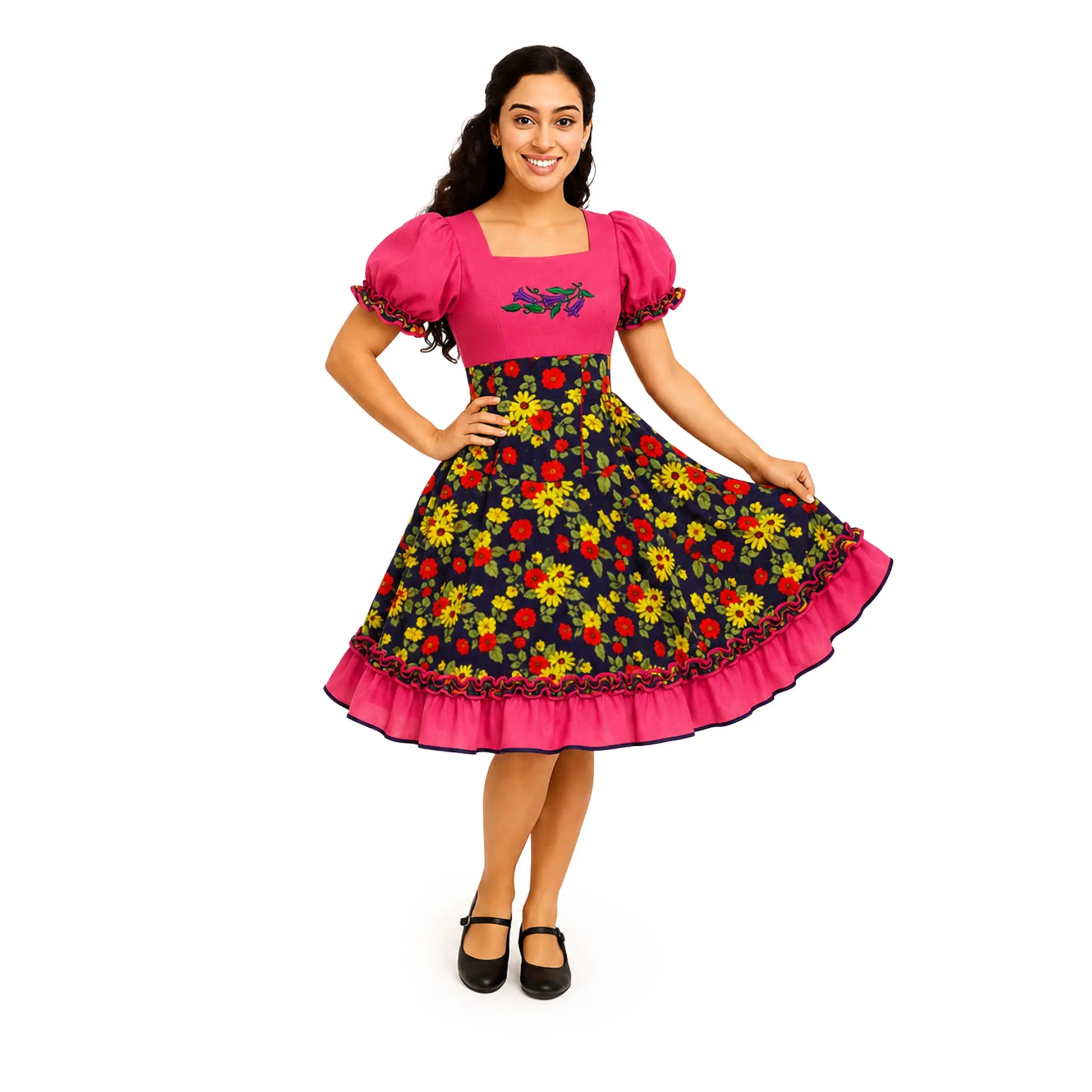 Woman wearing the Traditional Pink Floral Vestido Huasa Chinita, a Chilean cueca dress with a pink bodice and navy floral skirt with a pink ruffle hem.