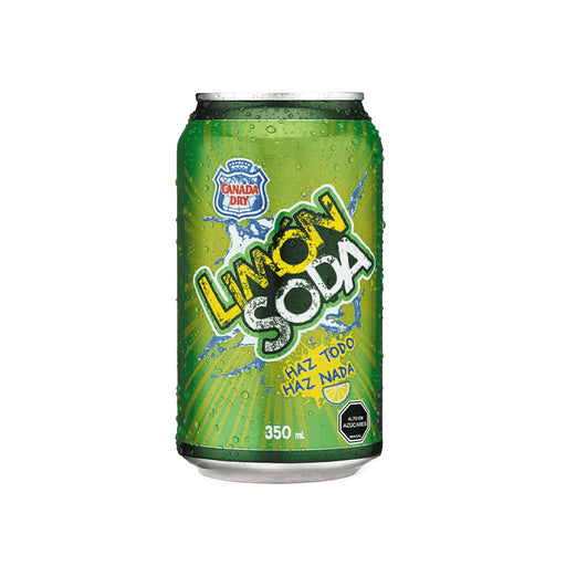 A green can of lemon soda with water on it.