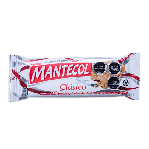 Packaging of Mantecol Clásico, a cocoa peanut butter bar. The package is predominantly white with red accents and features the product name and an image of the bar with visible cocoa and peanut butter.