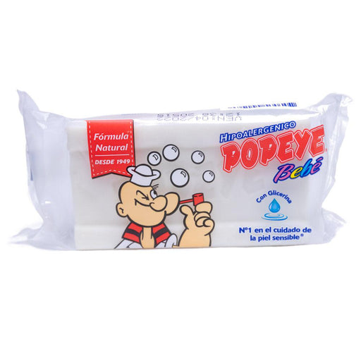 A white bar of soap for babies with Popeye blowing bubbles.