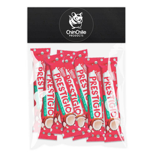 An eight pack of Prestigio candy bars in individually wrapped red packaging with coconuts on the front.